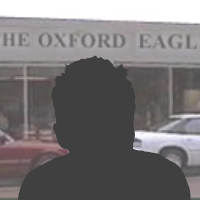 Silhouette of a man with the Oxford Eagle office in the background and the Oxford Weekly Planet logo superimposed